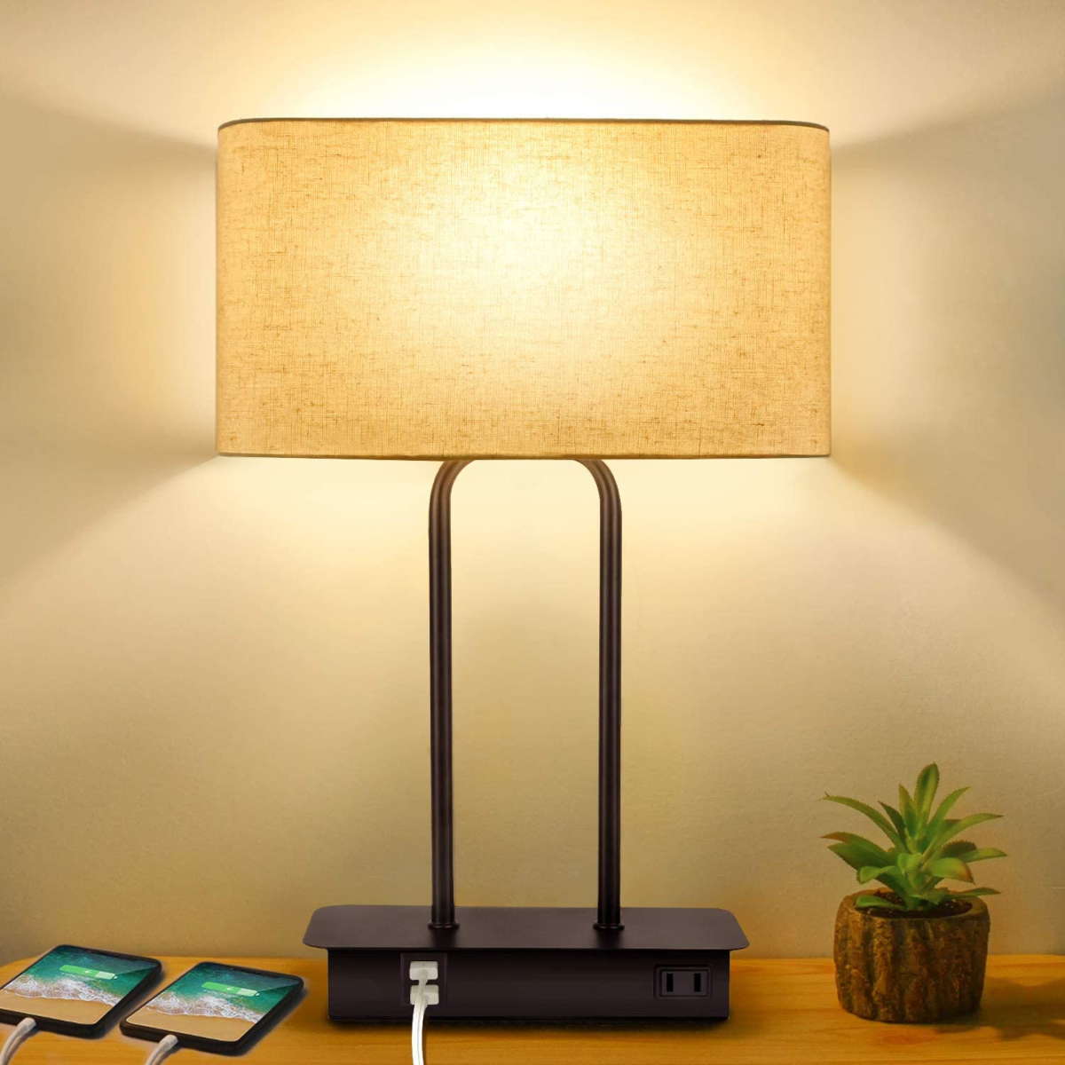 BesLowe minimalistic bedside table lamp lit up on a shelf