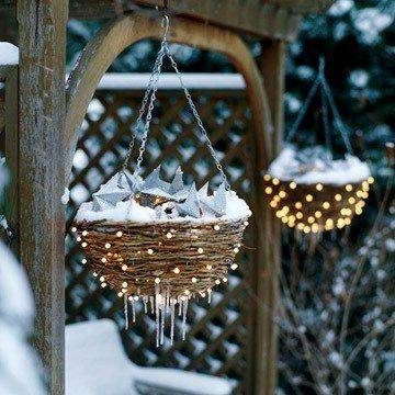 DIY Christmas Garden Chandelier made of hanging planters and fairy lights