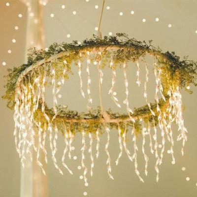 DIY Hula Hoop String Lights with green decoration
