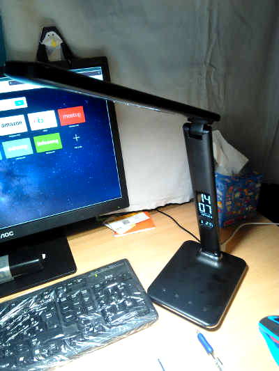 Modern LED lamp on a computer table