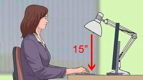 Infographic of the proper distance of the light source to a desk.