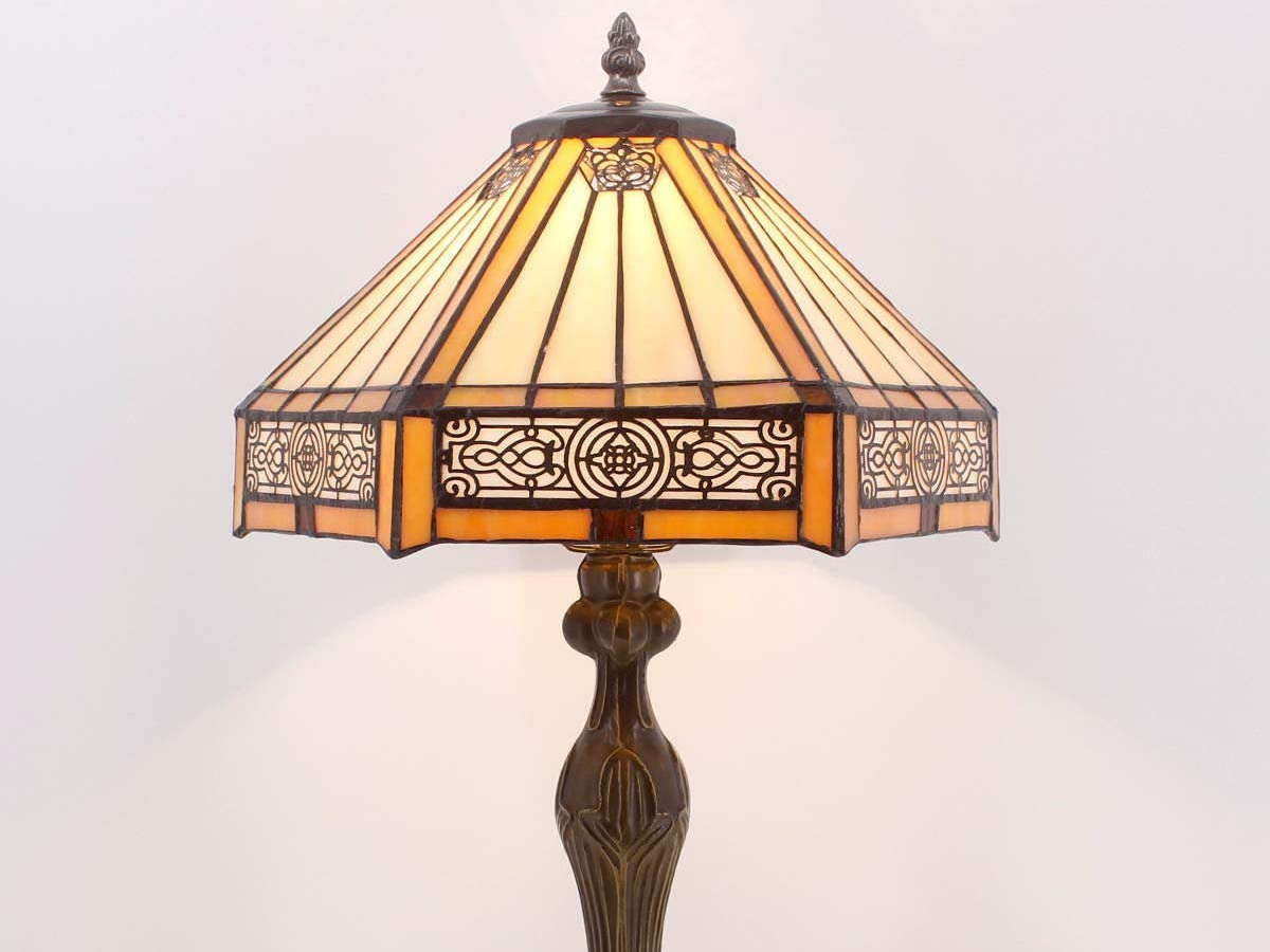 Lamp with a tiffany glass lamp shade